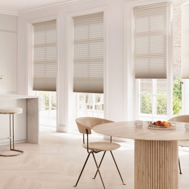 Elevate everyday living with Duette® Honeycomb Shades - where soft, filtered light meets energy-smart design. Call us today to bring this look home. (985) 209-1689
